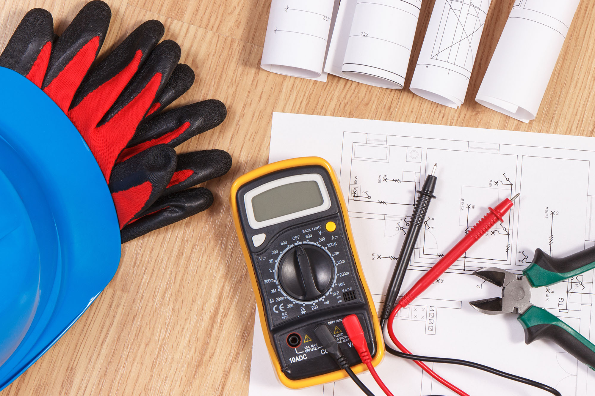 Electrical drawings, multimeter for measurement in electrical installation and accessories for engineer jobs